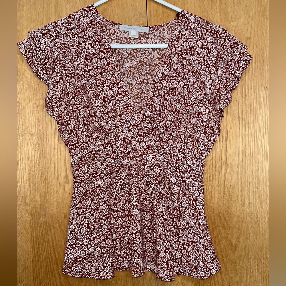 Red and white floral blouse